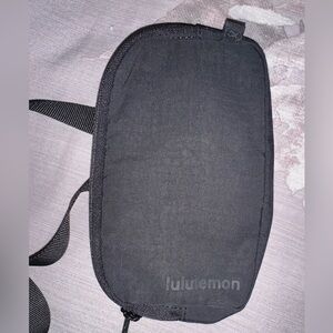 Lululemon small belt bag - black. Like new.
